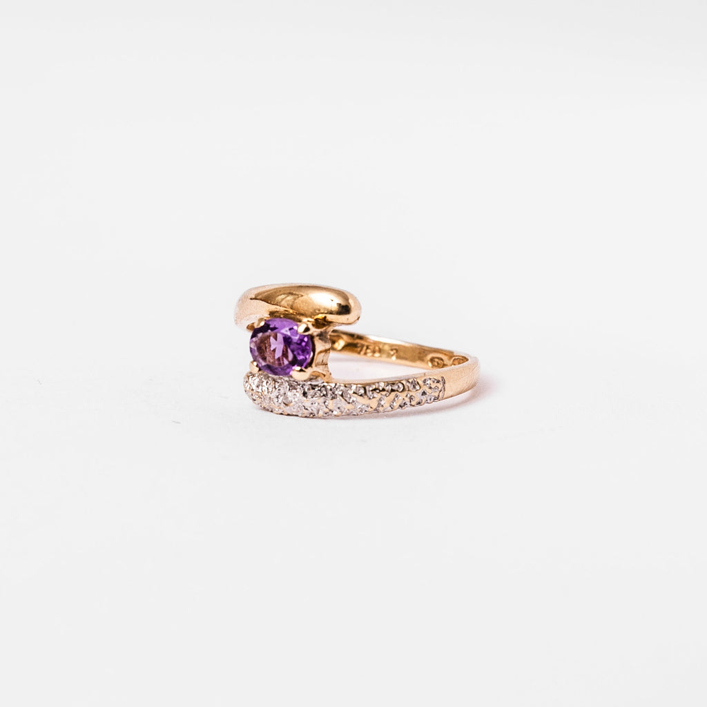 Bague en or jaune, or blanc et améthyste